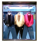 Image of clothes in a window display case